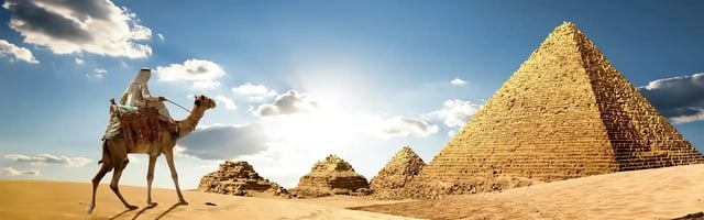 bedouin-on-camel-near-pyramids-in-desert
