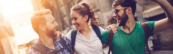 happy-traveling-tourists-sightseeing-with-map-in-hand