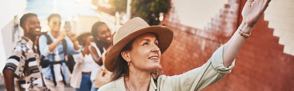 travel--education-and-a-teacher-with-students-on-school-field