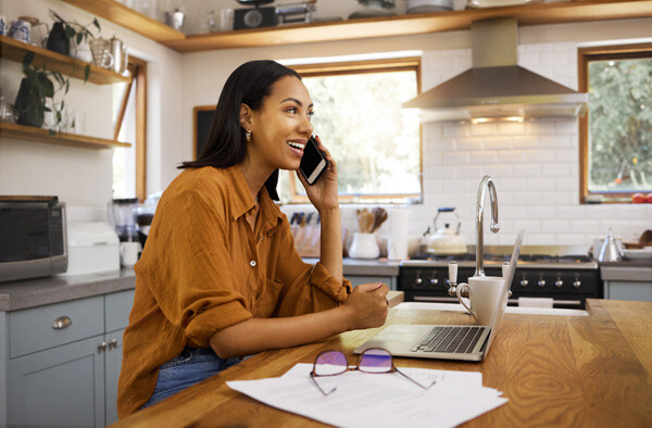 woman--phone-call-and-remote-work-with-laptop--conversation-and woman--phone-call-and-remote-work-with-laptop--conversation-and