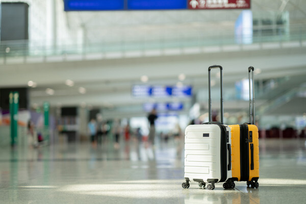 two-suitcases-in-an-empty-airport-hall--traveler-cases-in