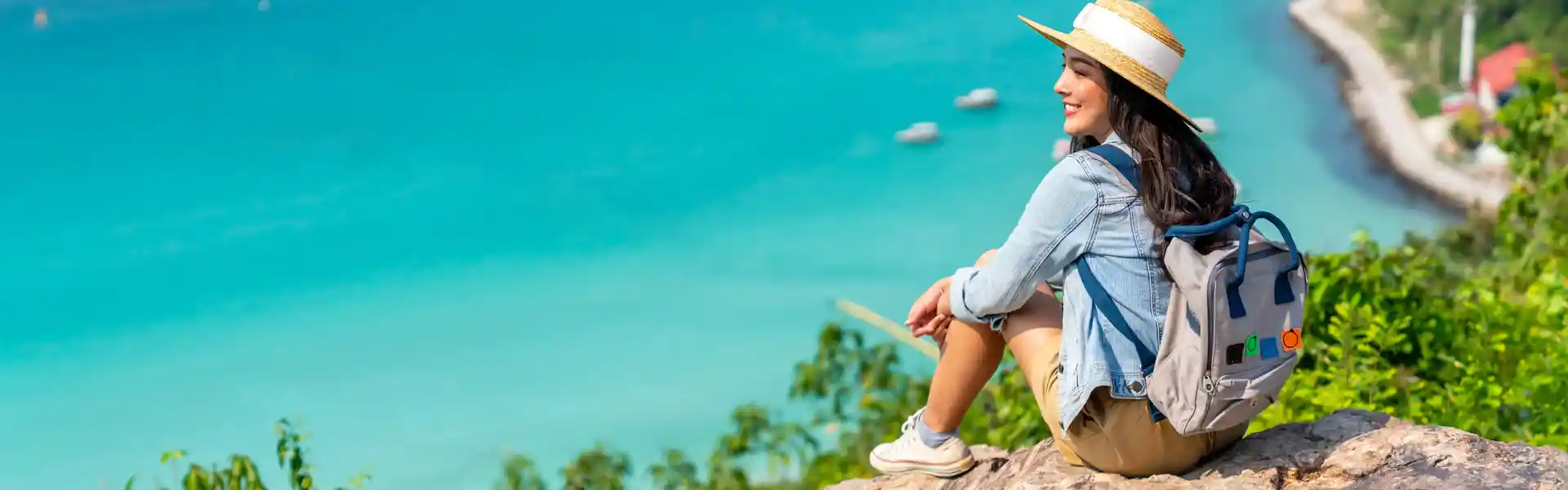 asian-woman-with-backpack-travel-at-tropical-island-and-resting