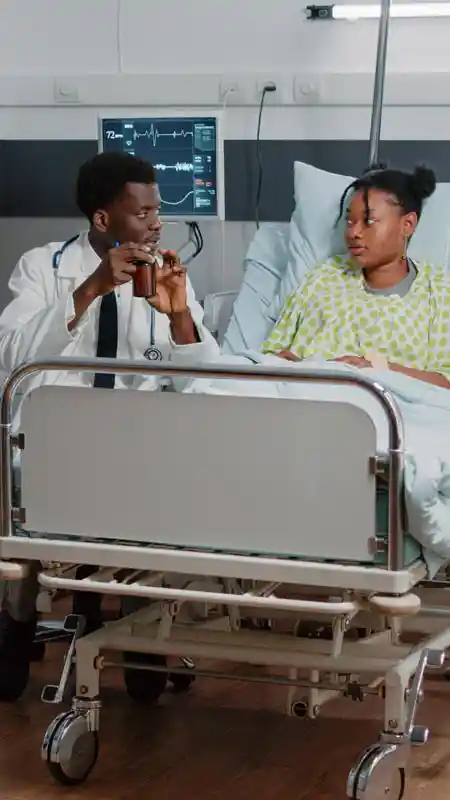 medic-holding-bottle-of-pills-to-give-to-sick-patient